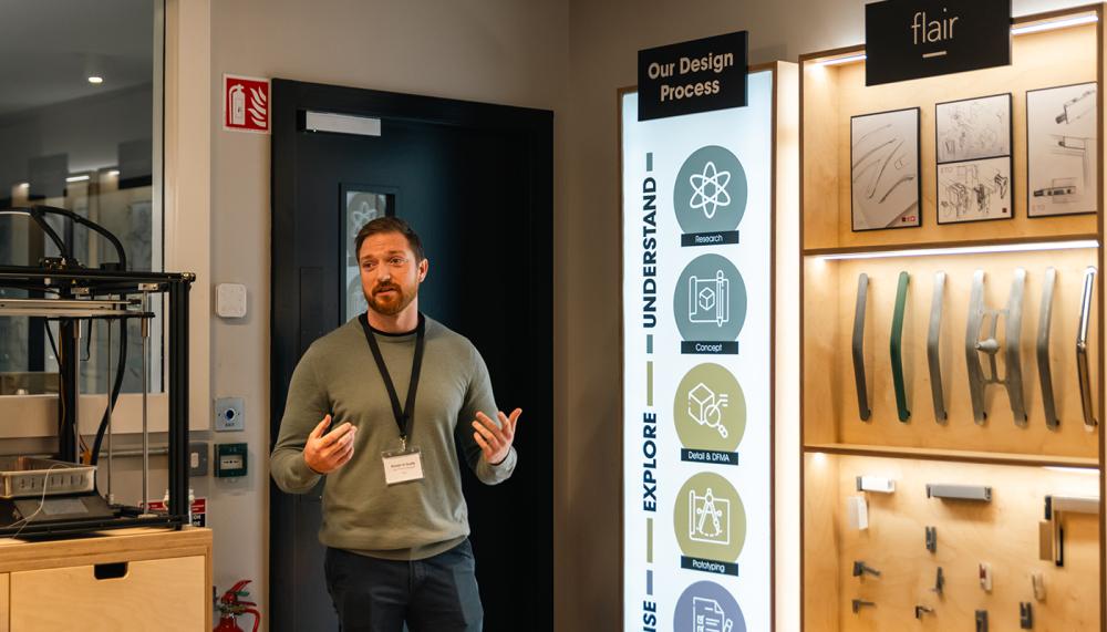 Ron&aacute;n O&rsquo;Grady, Lead Product Designer, Flair Showers, shows visitors the Testing Area
